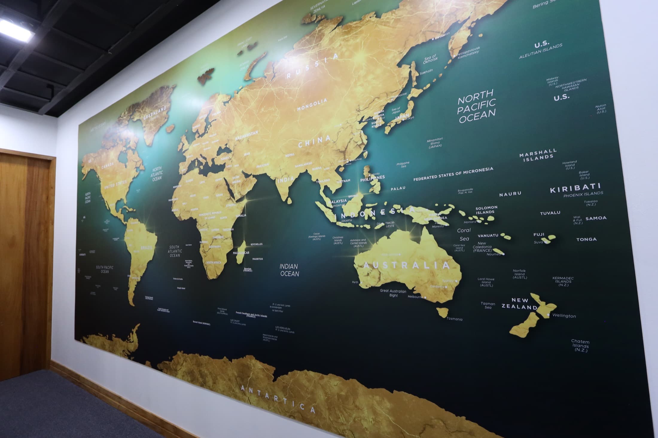 World map wall representing APV Healthcare's global reach